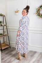 Modest high and low dress with ruffle sleeves and contrasting prints