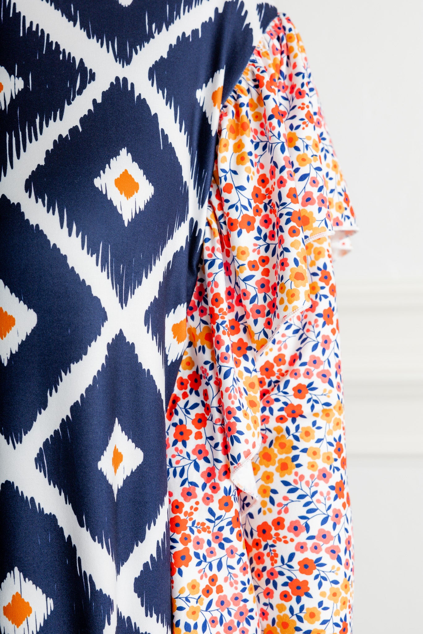 modest long sleeve top with contrasting prints