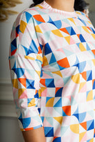 3/4 sleeve modest top with front pocket prints